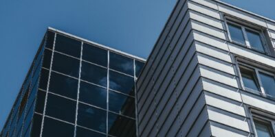 office building against a blue sky backdrop